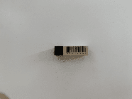 <b>Eraser Side</b><br> I captured the side of the eraser with my phone, highlighting its thickness. I chose this object because it is a simple rectangular prism with a minimalist packaging design.