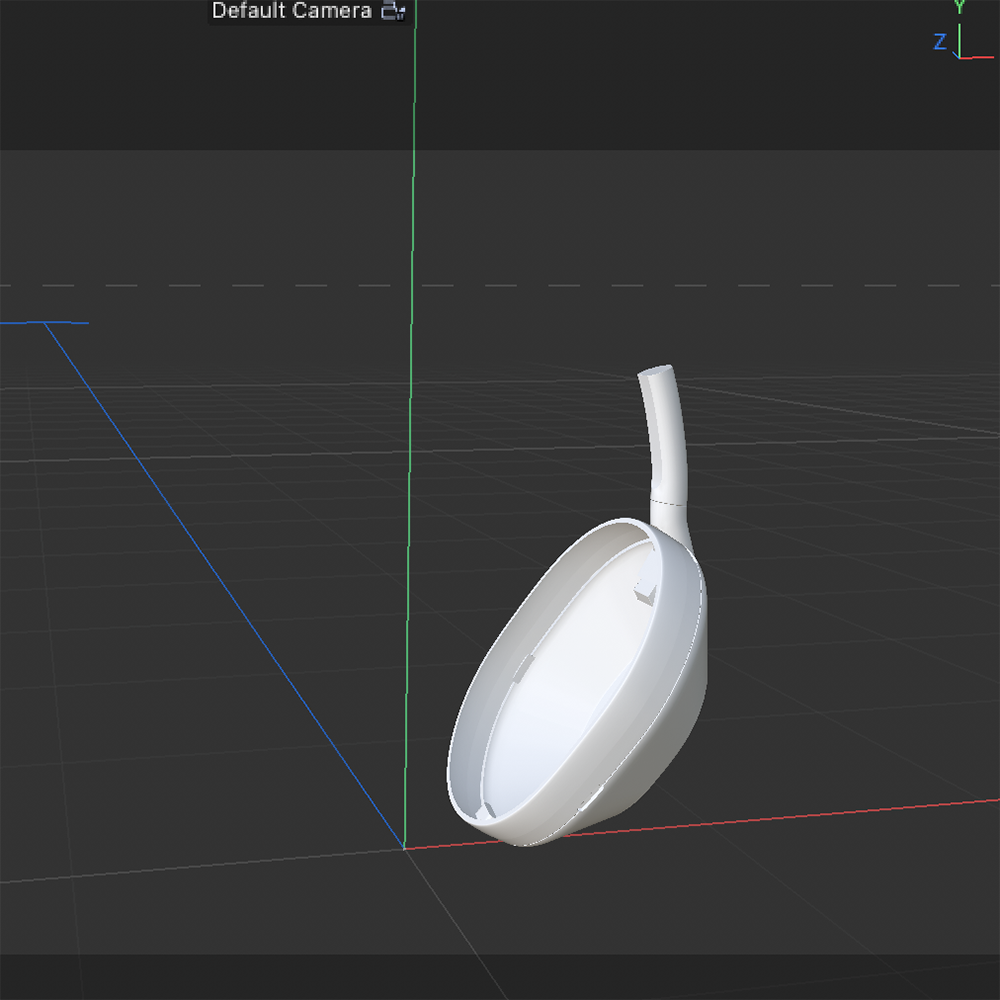 <b>Initial Shaping</b><br>I started by shaping the earpiece of the headphones in Cinema 4D. This stage involved molding the basic form into a smooth, oval shape to resemble the side view of the headphones.