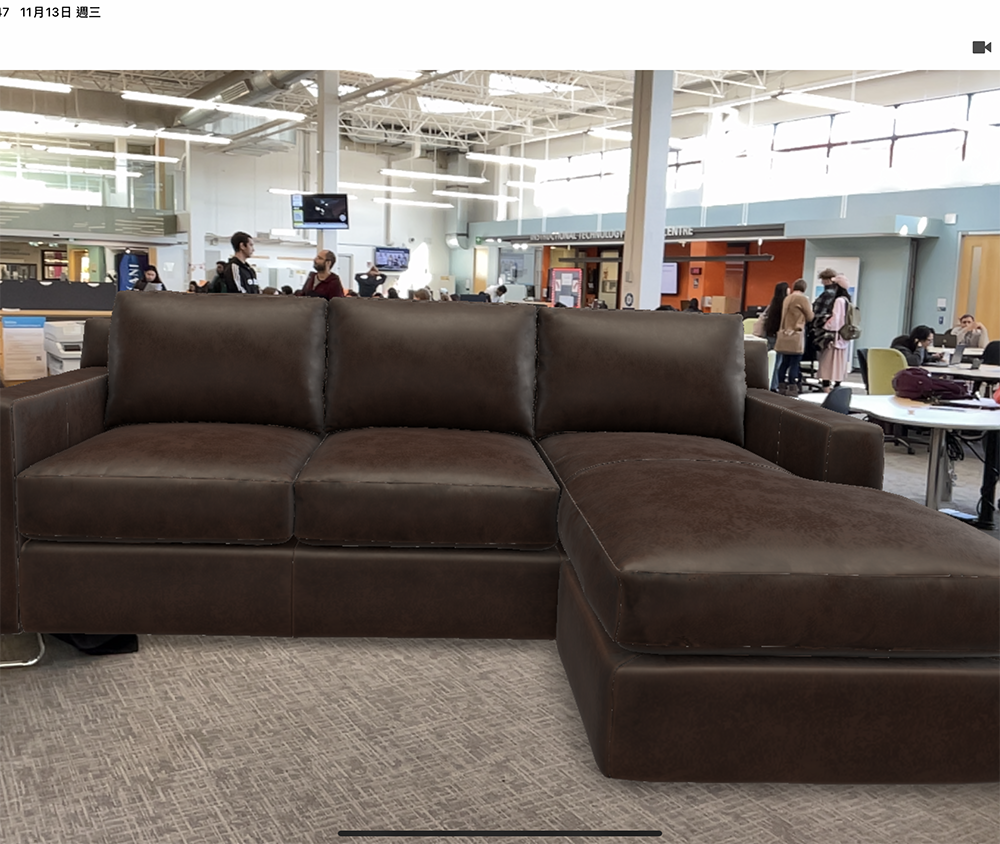 
<b>AR sofa in Learning Common </b><br>
I included this image to show how adding virtual furniture can change the study area. It represents a virtual sofa placed in the learning space using AR, imagining a more relaxed and comfortable area for students. My main takeaway is that AR can create new possibilities for how we think about and use shared spaces, adding flexibility and new functions without permanent changes.

