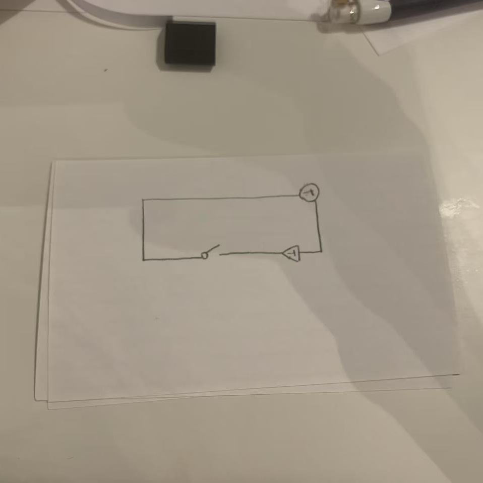 I drew a simple rectangular circuit diagram. It includes a battery, LED, and a clear connection layout.
