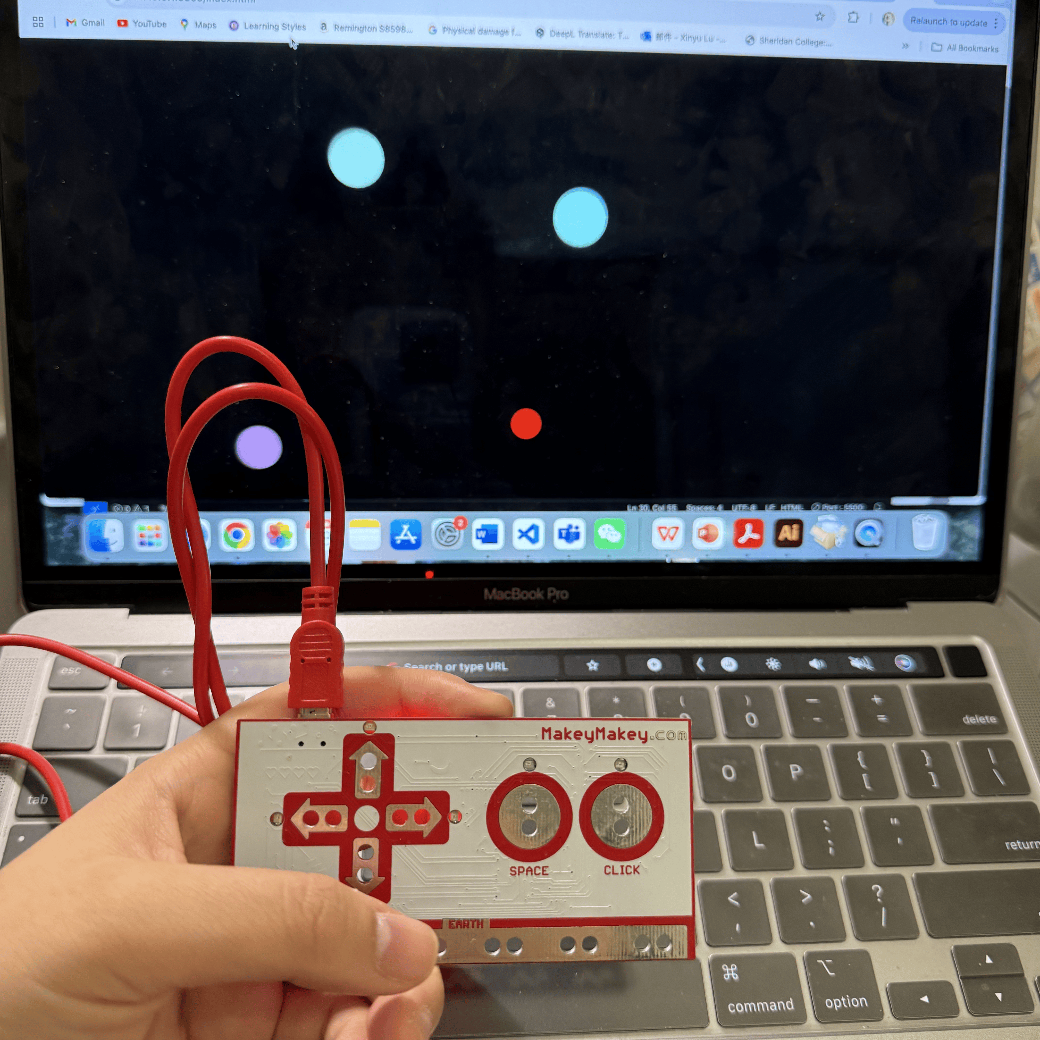 This image captures my setup using a Makey Makey device connected to my computer while running a p5.js sketch. I use the Makey Makey to control the movement of a red ball on the screen by pressing the arrow keys.