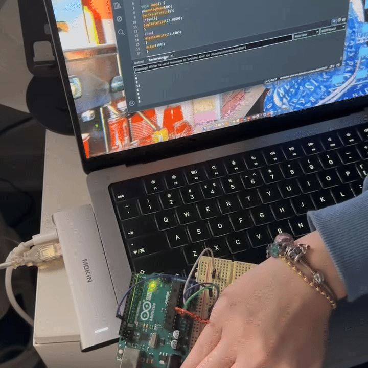 <b>Testing Light Sensor Input on Arduino</b><br>We moved our hand above the light sensor to test how the values changed in Arduino. The Serial Monitor showed different numbers when the light level changed. This helped us confirm that the sensor could read brightness correctly.