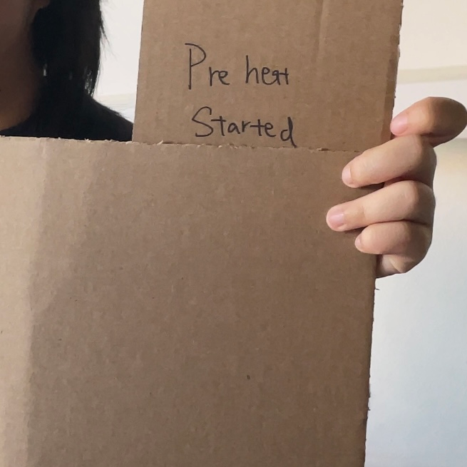 <b>Oven preheat sign</b><br>This cardboard sign represents the oven starting to preheat. After the user agrees to make the pie, the oven receives the recipe and begins warming up. It shows how different smart devices can share information.